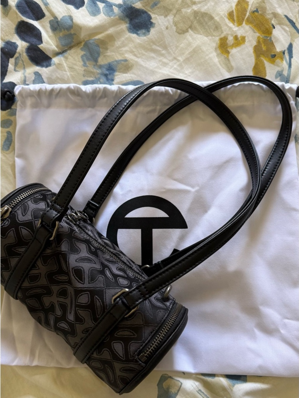 TELFAR MONOGRAMMED SMALL BLACK DUFFLE.